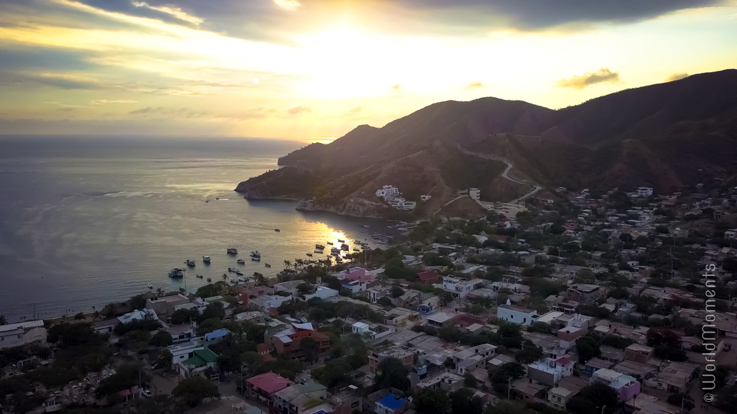 Sunset in Taganga, view of the bay shot with drone